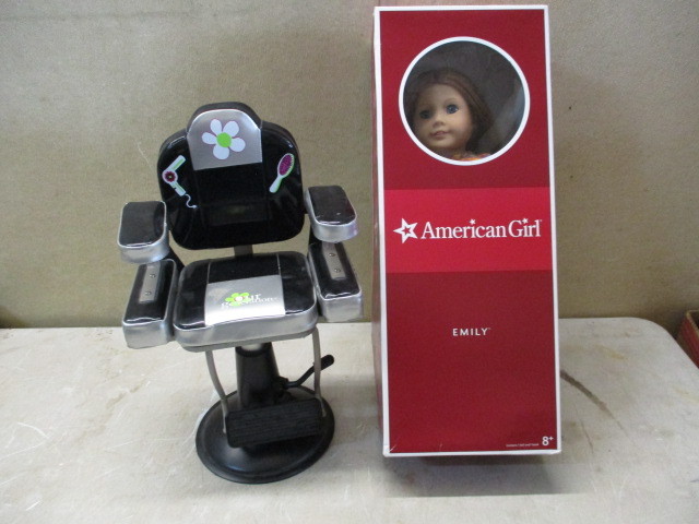 lot 27 image: American Girl Doll and chair
