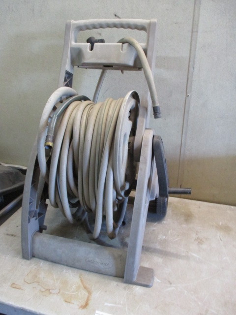 lot 62 image: Hose Reel and hose
