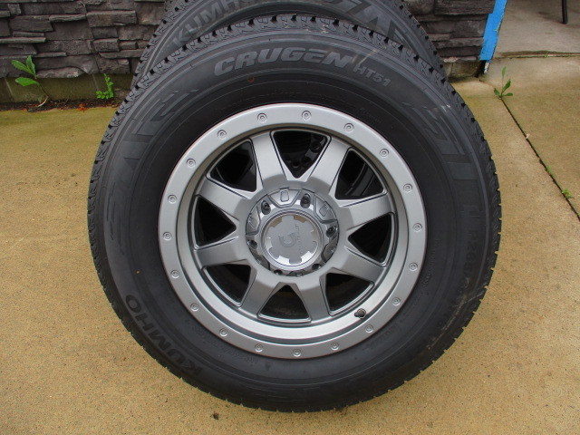 lot 1-2 image: Like New Chevy Aftermarket Rims and Tires