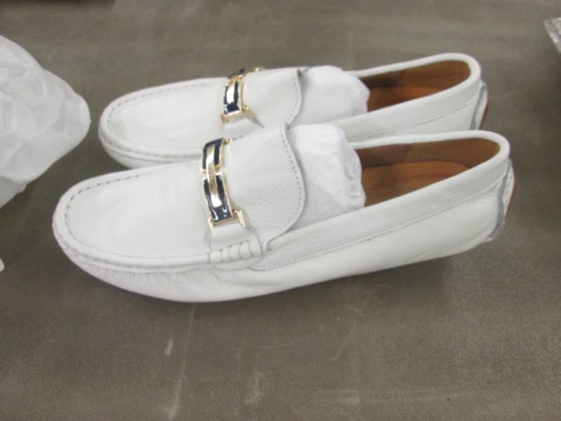lot 51 image: Size 7.5 White Loafers...