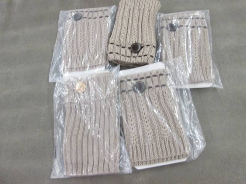 lot 73 image: 5 pr Tan Boot Cuffs...