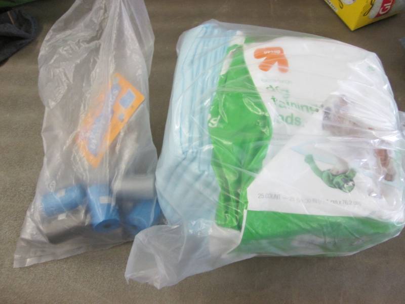 lot 145 image: Waste Bags & Puppy Training Pads...