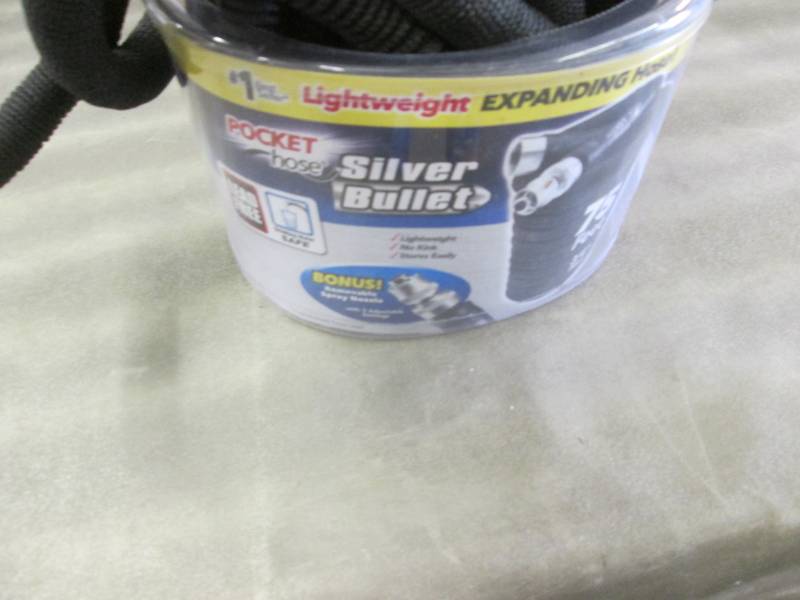 lot 154 image: Silver Bullet Pocket Hose open box...