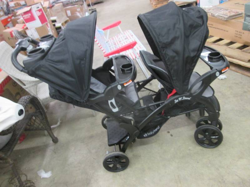 lot 164 image: babytrend 2 Seater Stroller, front ...