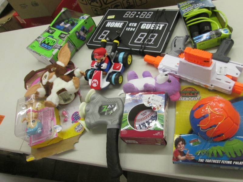 lot 203 image: Assorted Toys in Tote- no lid...