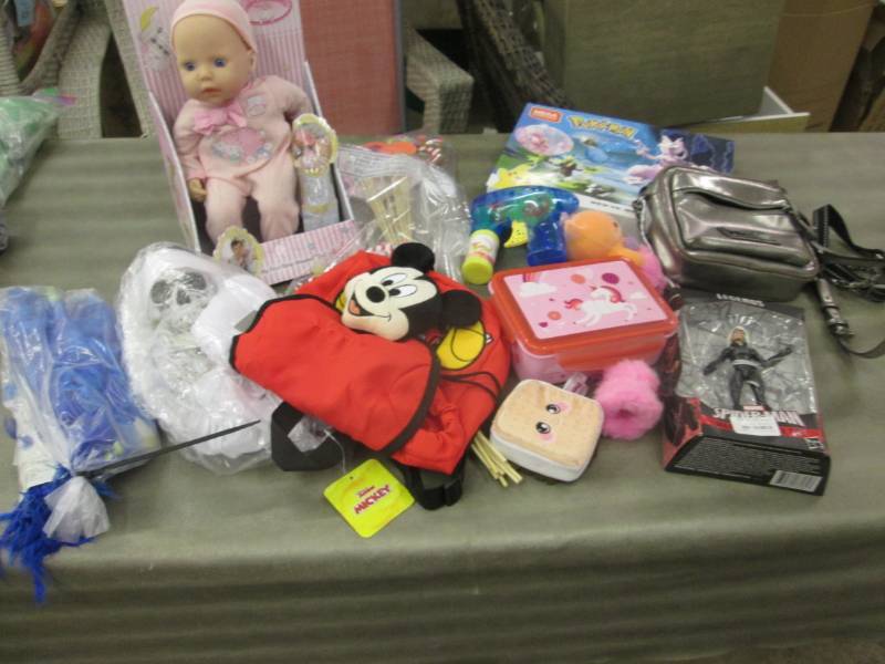 lot 227 image: Assorted Toys in Tote- no lid. Purs...