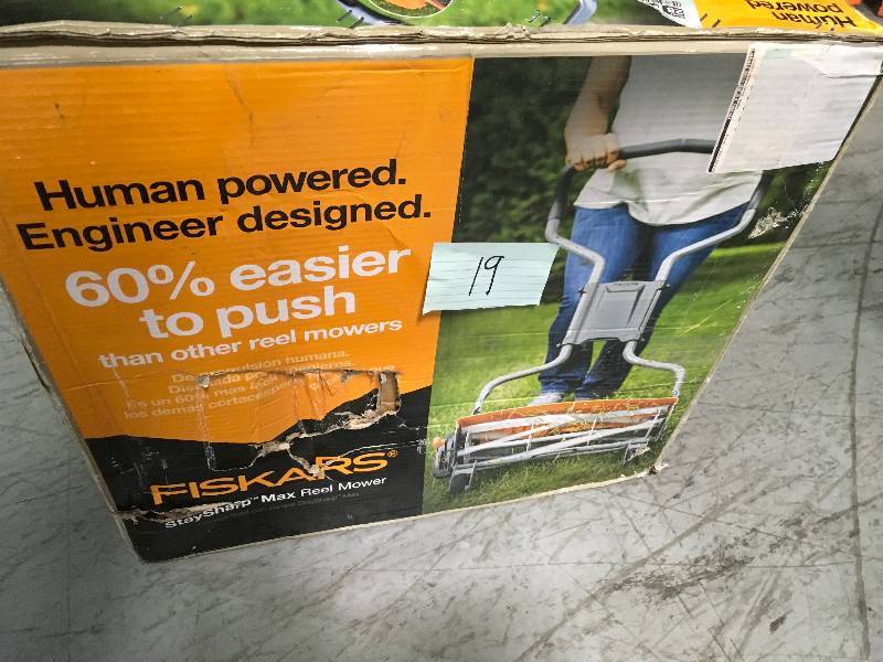 lot 19 image: Fiskars manual  lawmower used in good condition