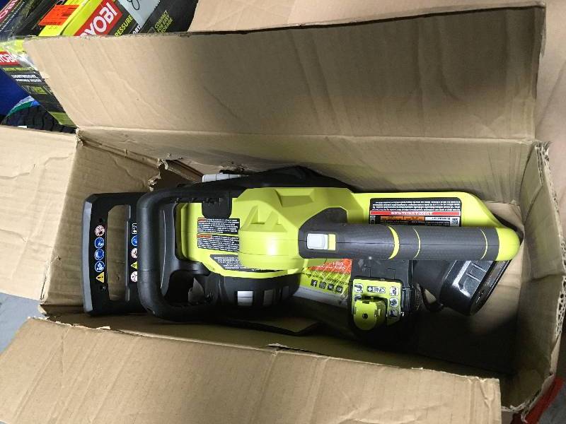 lot 91 image: Ryobi ONE 12 in. 18-Volt Brushless Lithium-Ion Electric Cordless Chainsaw - 4.0 Ah Battery and Charger Included in good condition