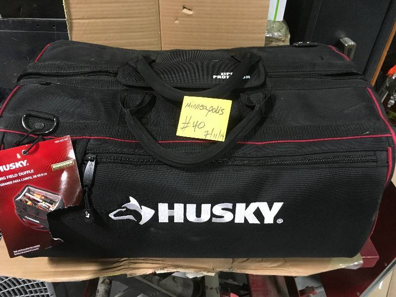 lot 1 image: Husky Field Duffle in like new condition