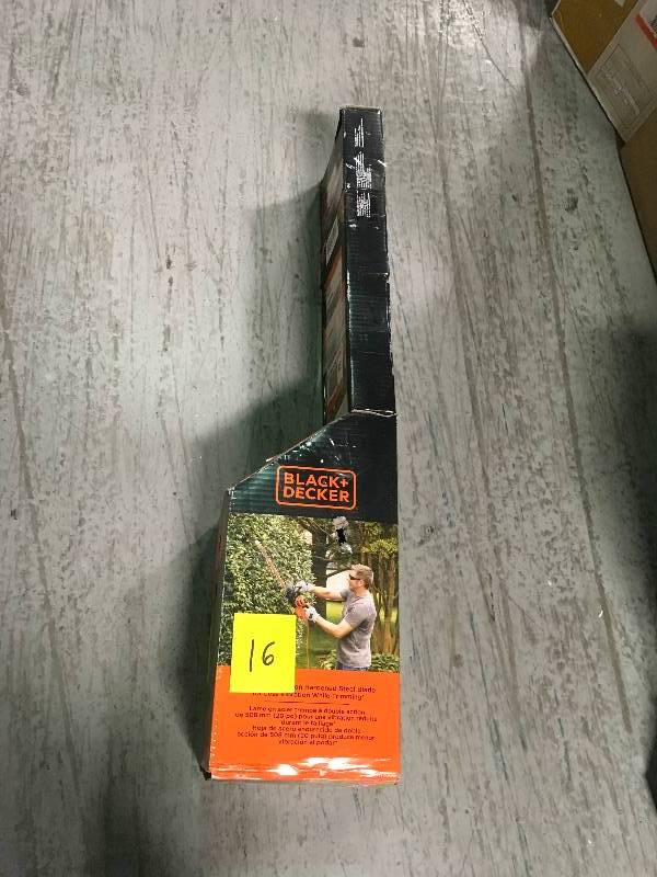 lot 16 image: Black and Decker 20 in. 3.8-Amp Corded Electric Hedge Trimmer in like new condition