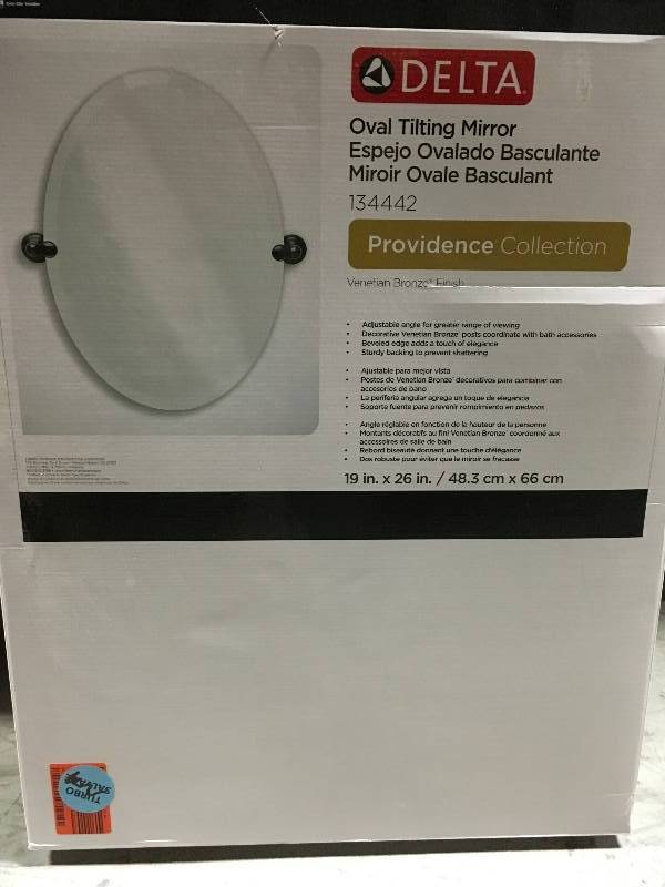 lot 2 image: Delta Oval Tilting Mirror not used