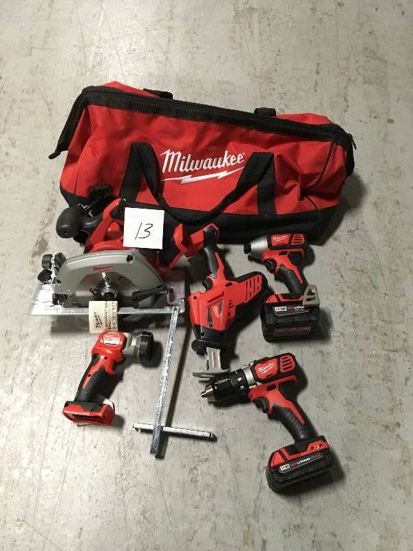 lot 13 image: Milwaukee M18 Cordless Lithium-Ion 5-Tool 1.5Ah3.0Ah Combo Kit in very good condition