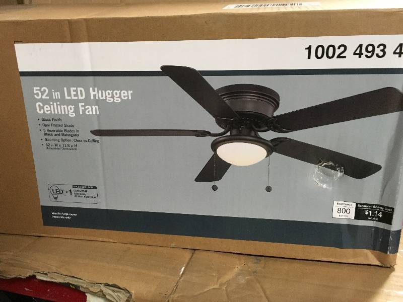 lot 75 image: Hugger 52 in. LED Indoor Black Ceiling Fan not used