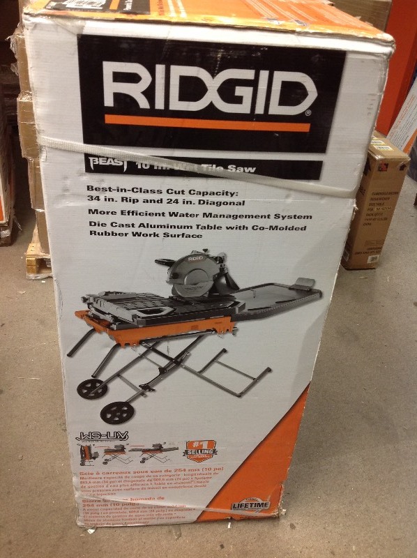 lot 103 image: RIDGID 10 in. Wet Tile Saw with Stand in good conditions not used