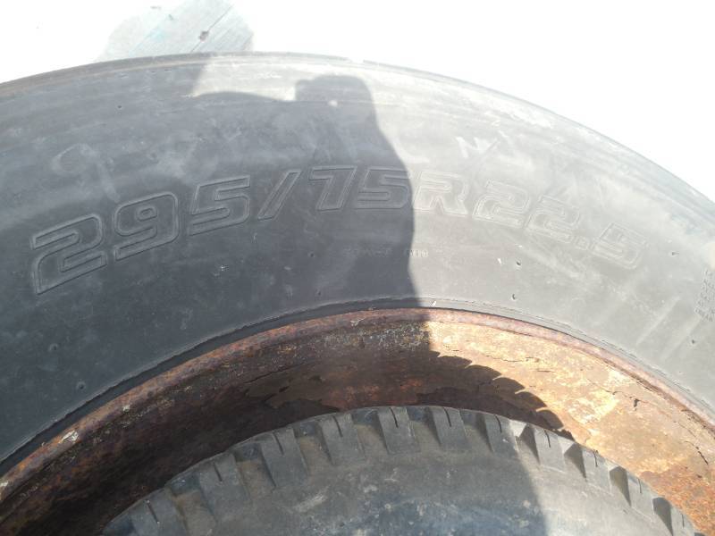 lot 46 image: TRUCK TIRE AND TWO SMALLER TIRES