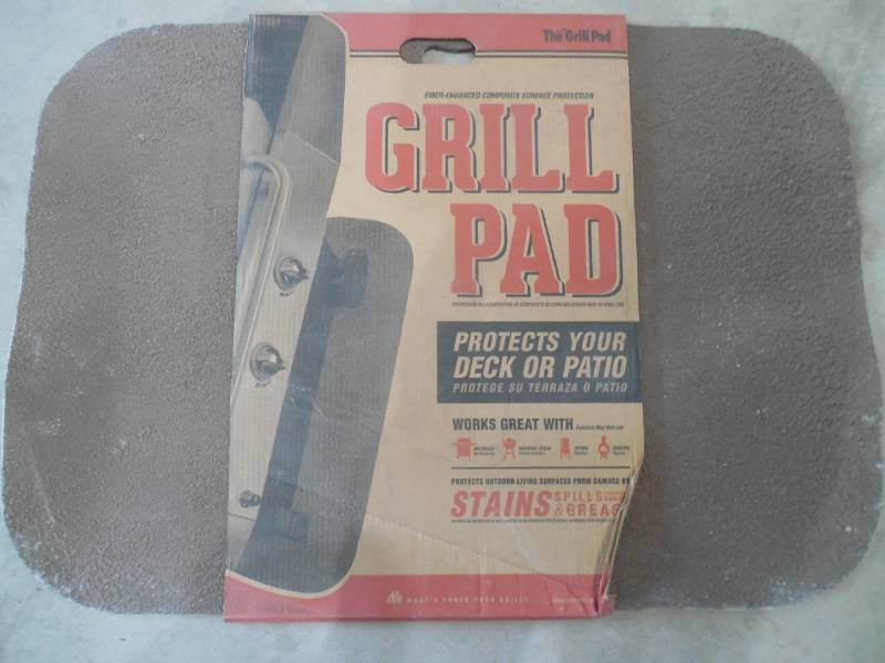 lot 66 image: The Original Grill Pad 42 in. x 30 in. Rectangle Earthtone Deck Protector