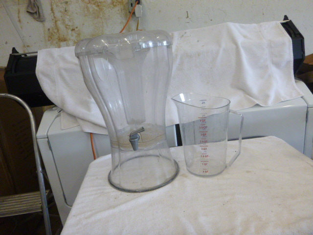 Beverage Dispenser and Measuring Cup