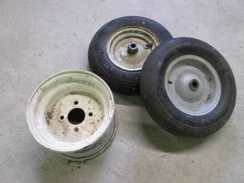 lot 12 image: 2 Wheel Barrow Wheels and Lawn Mowe...
