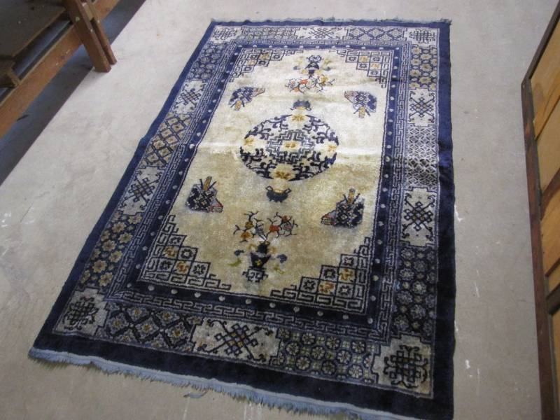 lot 58 image: 4 ft x 6 ft Area Rug  WHB...