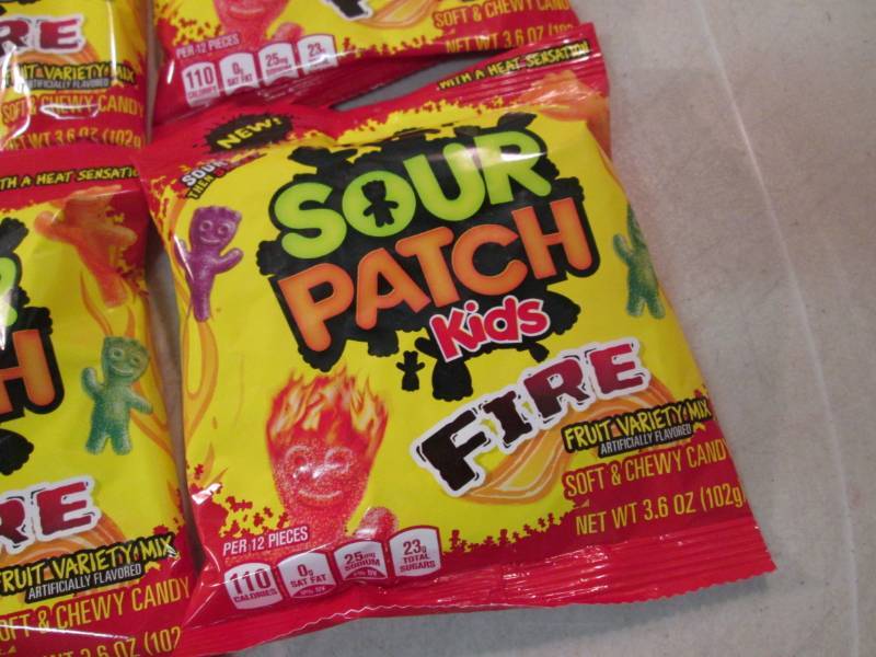 lot 143 image: Case of 12 Bags of Sour Patch Kids ...