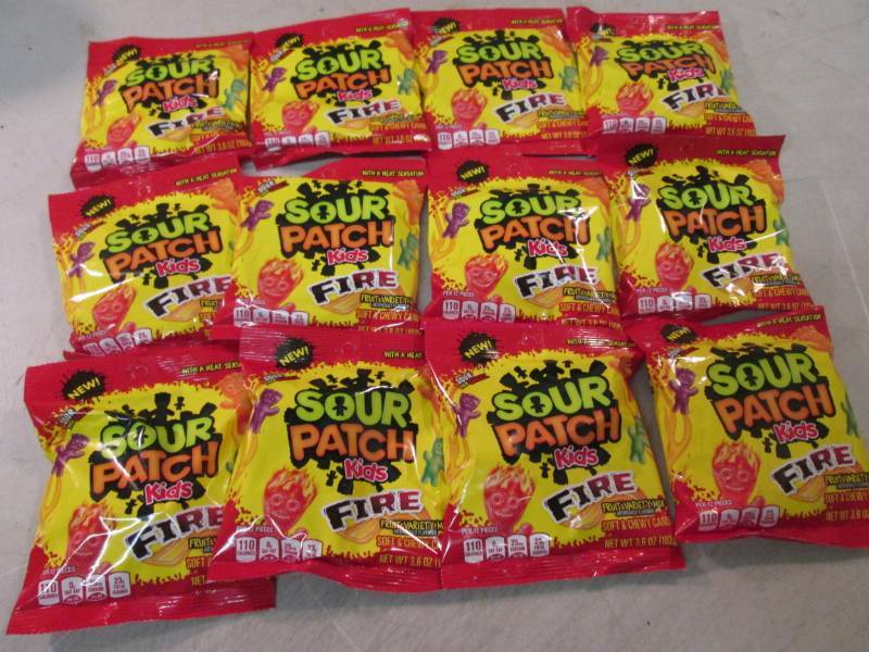 lot 144 image: Case of 12 Bags of Sour Patch Kids ...