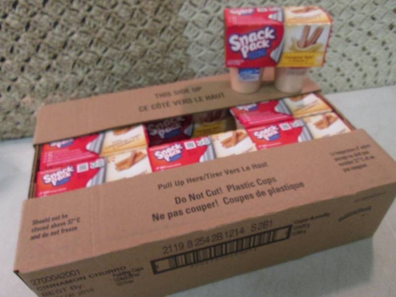 lot 158 image: Case of 12 4-Pack Cups of Cinnamon ...