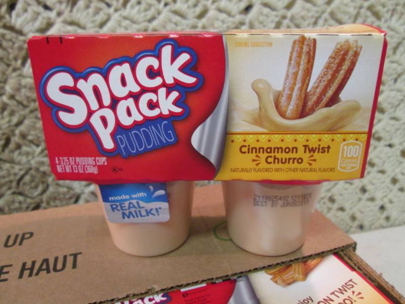 lot 159 image: Case of 12 4-Pack Cups of Cinnamon ...