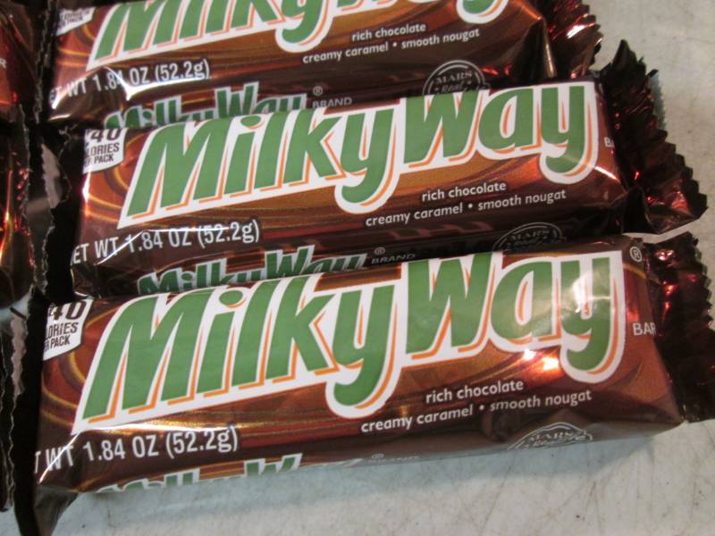 lot 173 image: 12 Milky Way Candy Bars Best by Apr...