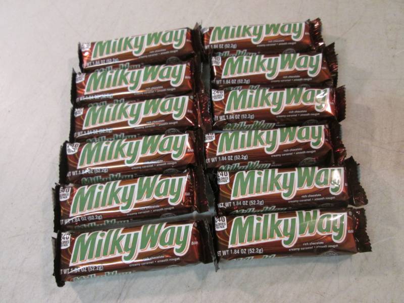 lot 174 image: 12 Milky Way Candy Bars Best by Apr...