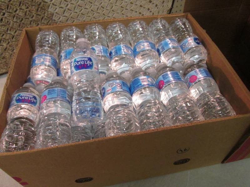 lot 201 image: Banana Box Full of 16.9 ounce Nestl...