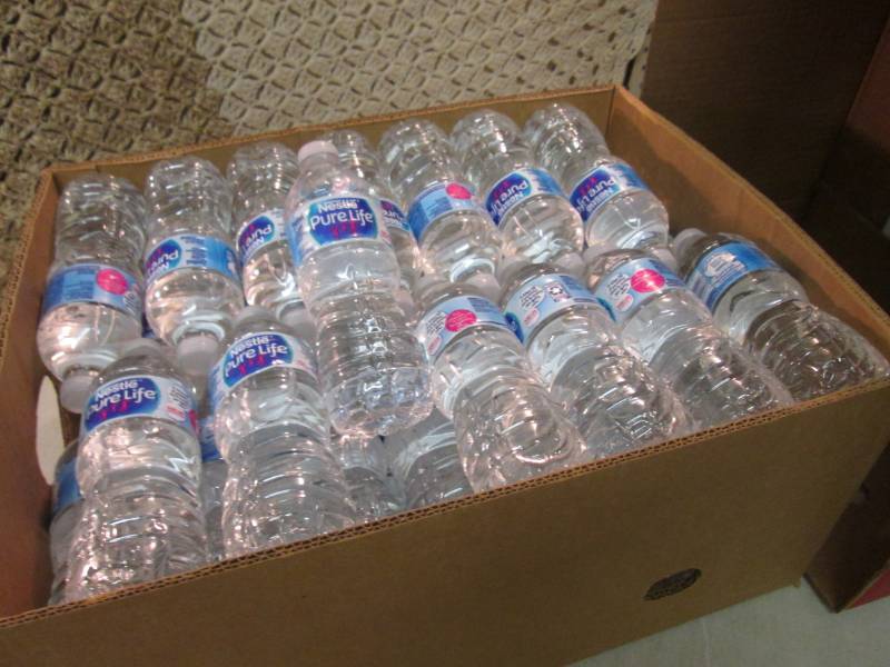 lot 202 image: Banana Box Full of 16.9 ounce Nestl...