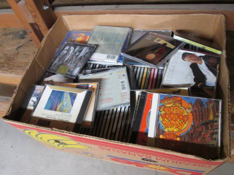 lot 245 image: Box Full of Cds Etc...