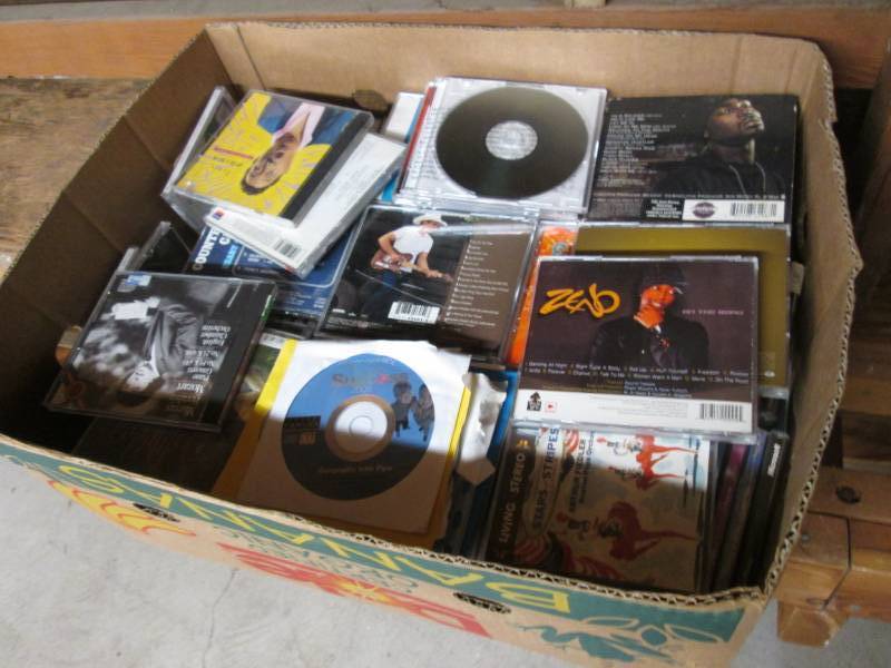 lot 246 image: Box Full of Cds Etc...