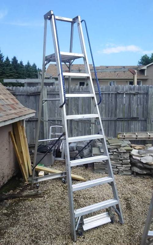 lot 1 image: Aluminum Ladder With Wheels (8 Ft 300 Lb)