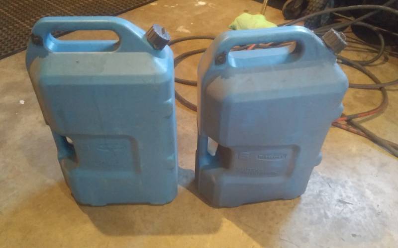 lot 54 image: 2-6 Gallon Gas Cans
