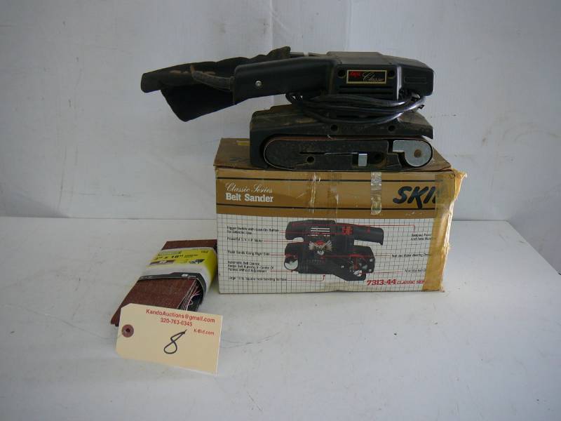 lot 8 image: Skil Belt Sander With Sandpaper
