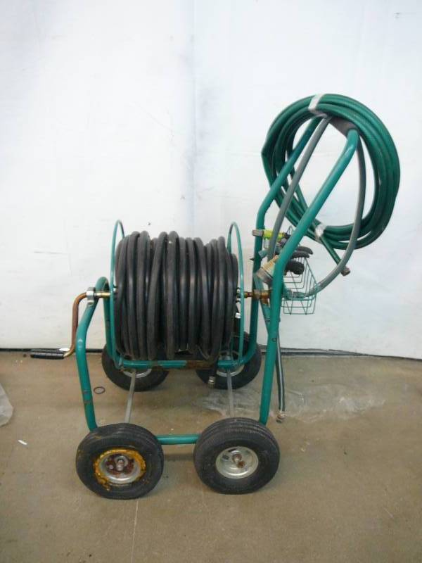 lot 92 image: Garden Hose Reel Cart With Hose