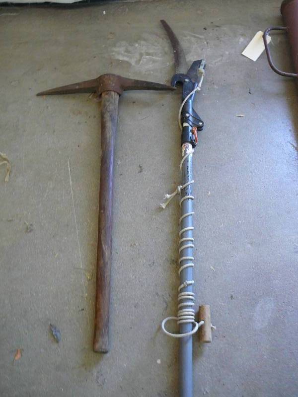lot 99 image: Pruner & Pick Axe