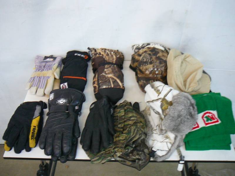 lot 211 image: Lot Of Guys Gloves, Mittens, Camo Hats, Stocking Hats, Camo Cover Up Hats