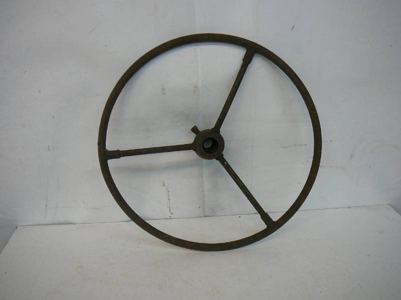 lot 193 image: Antique Tractor Steering Wheel
