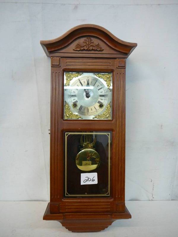 lot 206 image: Wooden Wall Clock With Key