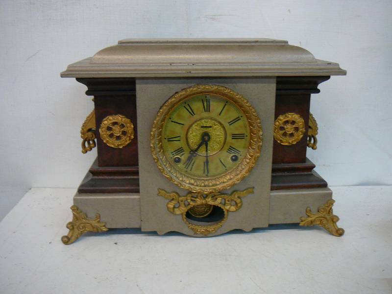 lot 296 image: Antique T.H.E. Ingraham Clock Company Clock With Key