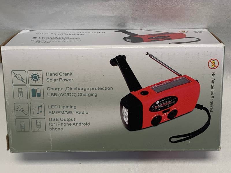 lot 35 image: Solar PoweredHand Crank Light, Cell Phone Charger, and Emergency Radio