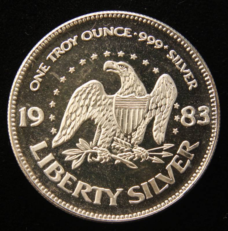 lot 29 image: 1 TROY OZ. .999 FINE SILVER 1983 A-MARK LIBERTY