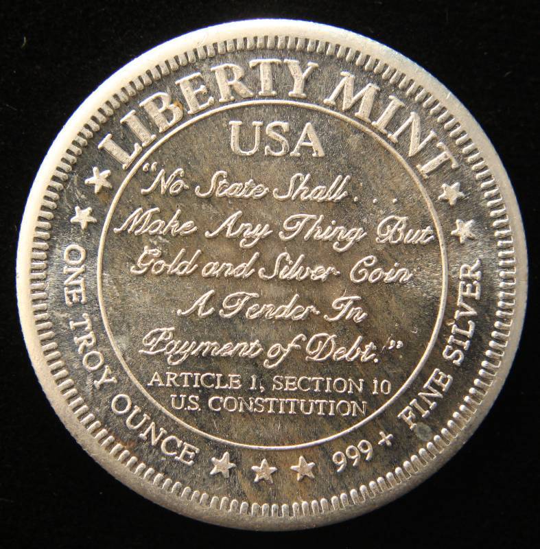 lot 43 image: 1 TROY OZ. .999 FINE SILVER VINTAGE LIBERTY ROUND