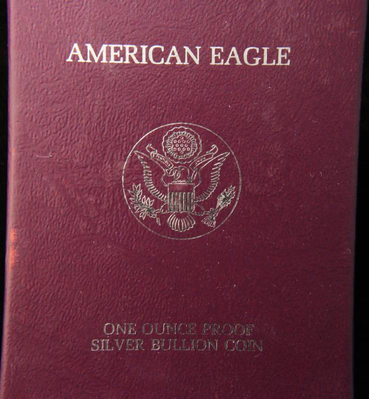 lot 47 image: 1986 PROOF AMERICAN SILVER EAGLE 1 TROY OZ. .999 FINE SILVER ORIGINAL PACKAGING