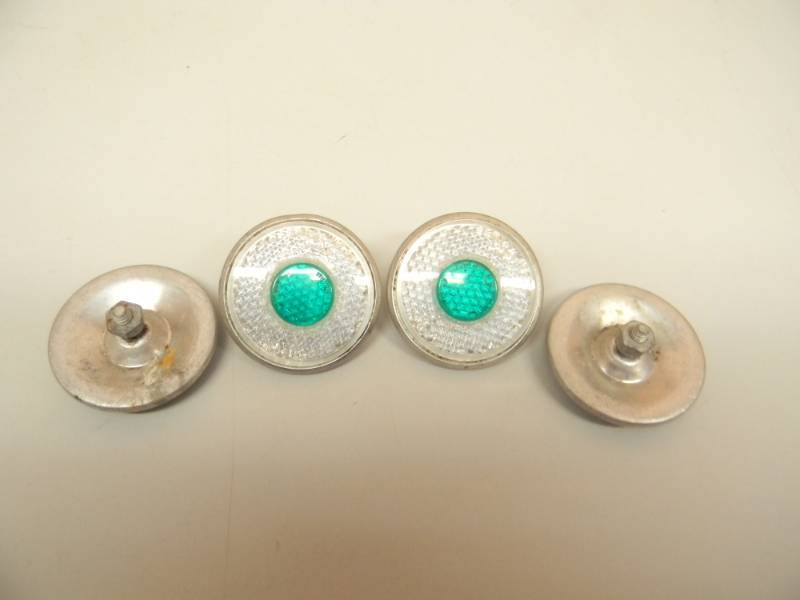 lot 13 image: (4) VINTAGE - VERY RARE - STIMSONITE MULTI COLOR GREENWHITE BICYCLEAUTOMOTORCYCLE  REFLECTORS - SEE PICTURES