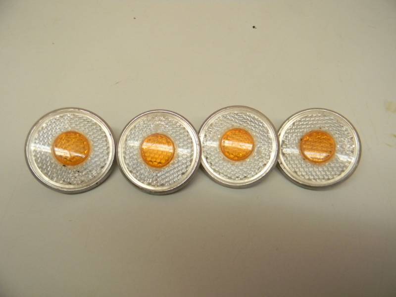 lot 14 image: (4) VINTAGE - VERY RARE - STIMSONITE MULTI COLOR YELLOWWHITE BICYCLEAUTOMOTORCYCLE  REFLECTORS - SEE PICTURES