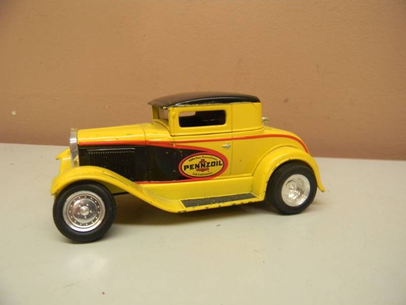 lot 76 image: SPEC CAST FORD MODEL A PENNZOIL BANK 125 SCALE LIMITED EDITION -  SEE PICTURES