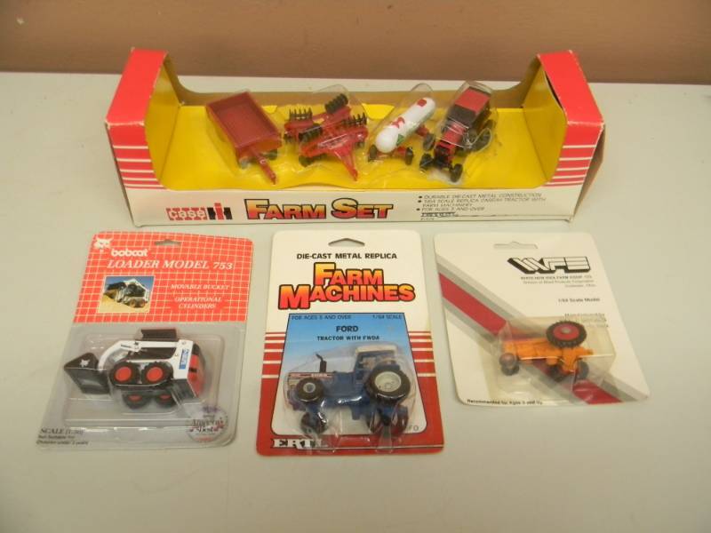 lot 109 image: ERTL CASE INTERNATIONAL HARVESTER FARM SET 164 SCALE WITH MINNEAPOLIS MOLINE, FORD, & BOBCAT - IN PACKAGE 164 SCALE - SEE PICTURES